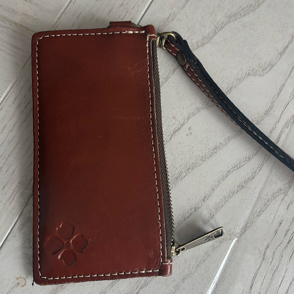 vera Bradley leather wristlet.  barely used.